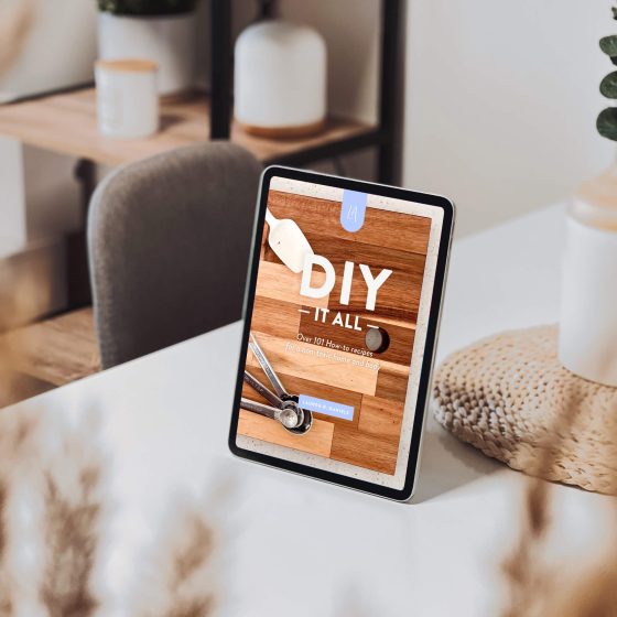ebook on ipad on dining room table | DIY-IT-ALL: Over 101 How-to Recipes for a Non-toxic Home and Body | LAurenrdaniels